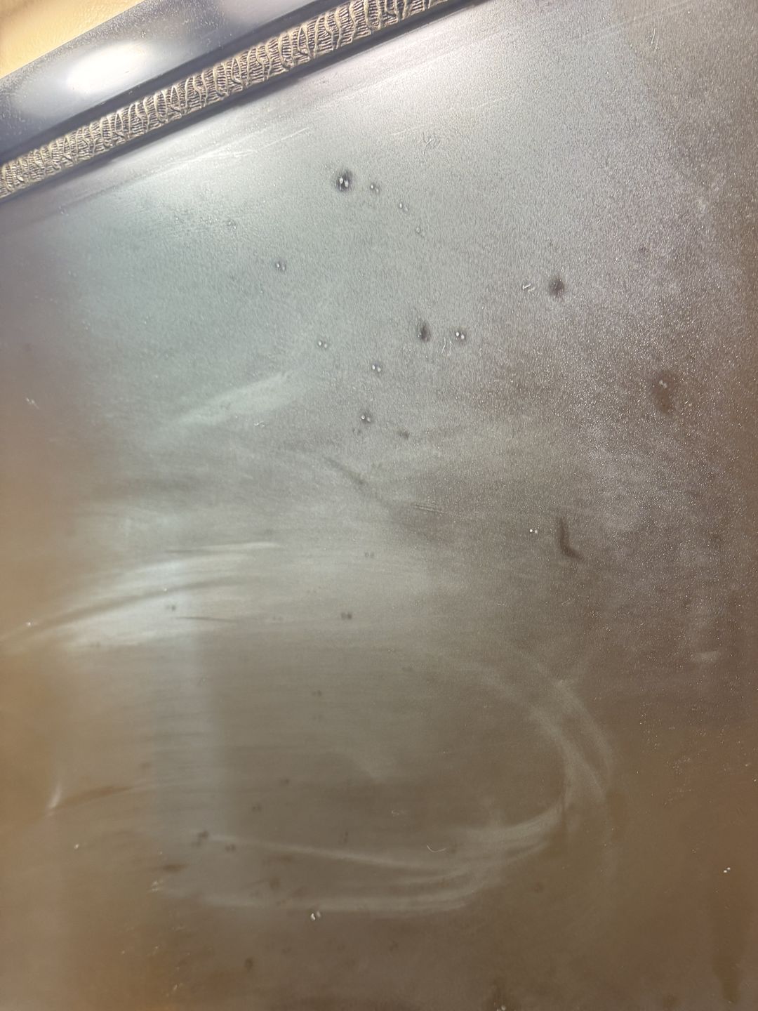 Bathroom mirror fogged over with condensation after a hot shower