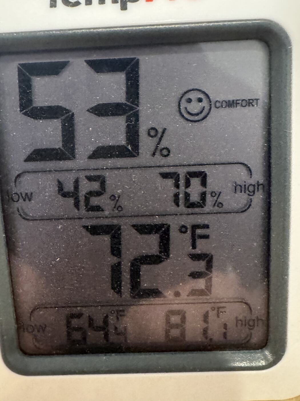 A room humidity gauge reading 53 percent, with a 24-hour range of 42 percent low and 70 percent high